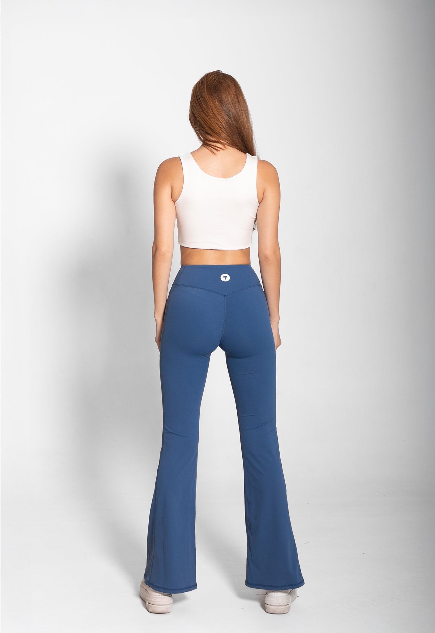 THE SCULPTING FLARE PEACH LEGGINGS / BLUE